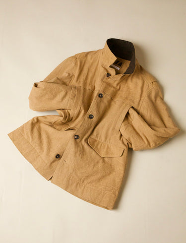 Beige barn coat on a beige background