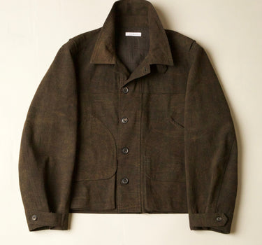 Brown jacket on a light beige background