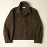 Brown jacket on a light beige background
