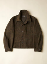 Brown jacket on a light beige background