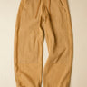Tan pants with drawstring on a beige background