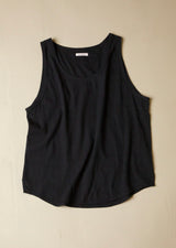 Black tank top on a beige background