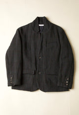 Dark gray jacket on a light beige background