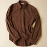 Brown shirt on a beige background