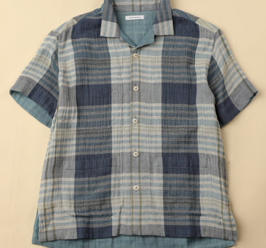 Plaid shirt on a beige background