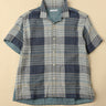 Plaid shirt on a beige background