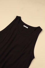 Plum sleeveless top with a brand label on a beige background