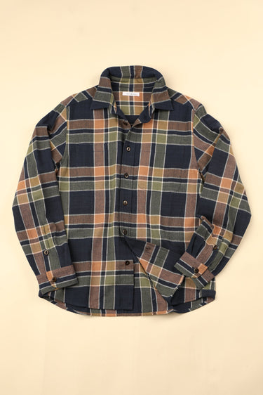 Plaid shirt on a beige background