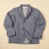Light Blue handwoven jacket on a beige background