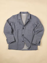 Light Blue handwoven jacket on a beige background