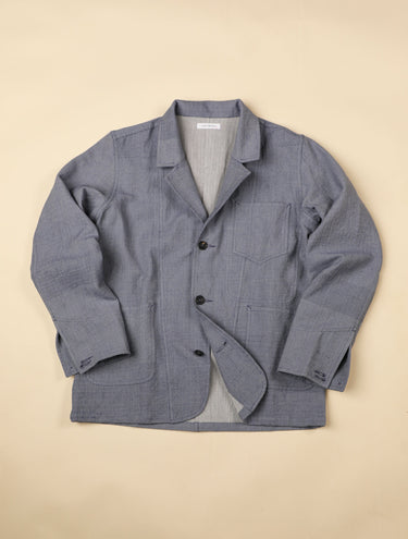 Light Blue handwoven jacket on a beige background