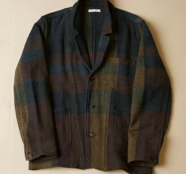 Plaid jacket on a beige background