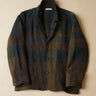 Plaid jacket on a beige background