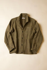 An olive green wool-blend work jacket with a button-up front, laid flat against a light beige background.